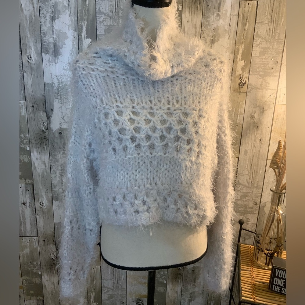 Free People open knit fuzzy turtle next sweater. Size S